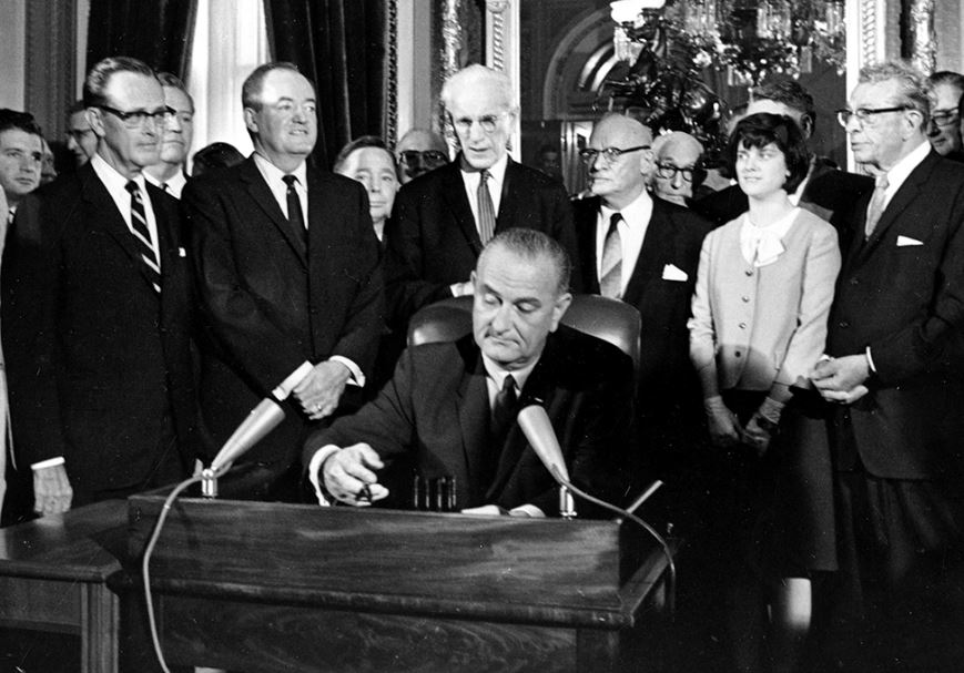 Babbs-v.-Wilkie_LBJ-signing