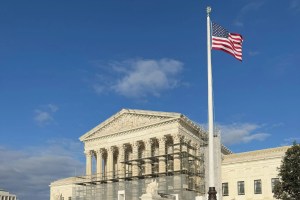 Scaffolding in front of the Supreme Court building on a sunny day
