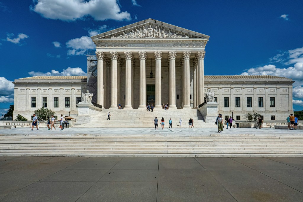 People walk outside the US Supreme Court in Washington, D.C.