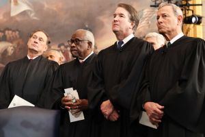 (From L-R) US Associate Supreme Court Justices Samuel Alito, Jr., Clarence Thomas and Brett Kavanaugh and U.S. Supreme Court Chief Justice John Roberts look on during inauguration ceremonies in the Rotunda of the U.S. Capitol on January 20, 2025 in Washington, DC.