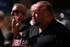 InfoWars founder Alex Jones speaks to the media outside Waterbury Superior Court during his trial on September 21, 2022 in Waterbury, Connecticut.