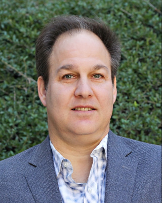 Jordan Steiker's Headshot